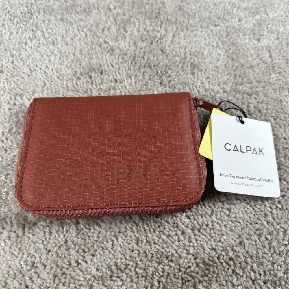 NWT CALPAK Terra Zip Passport Wallet RFID Protected Clay Color